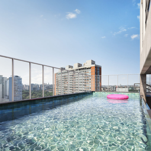Perspectiva artística da piscina no rooftop do empreendimento ALDEA Pernambuco, um lugar para aproveitar o tempo, acima do movimento urbano.